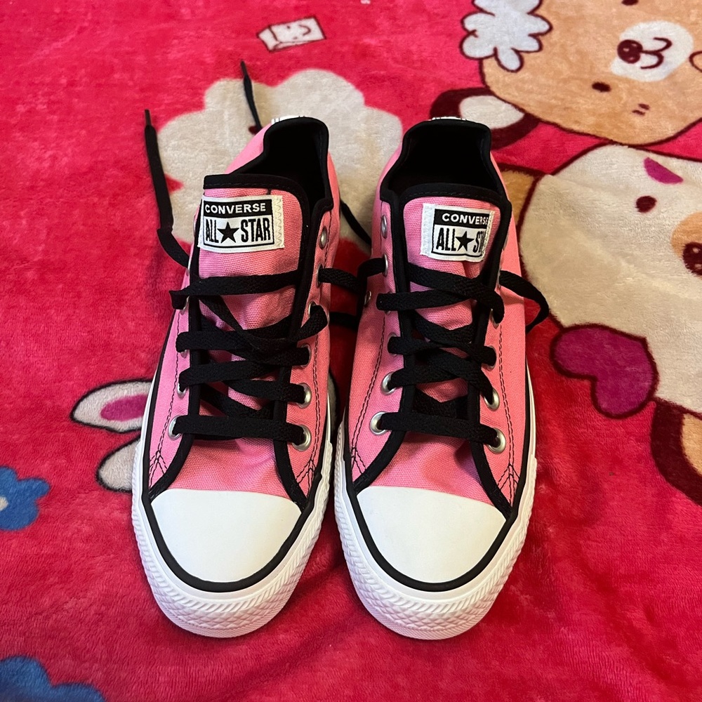 Pink and white brand new converses